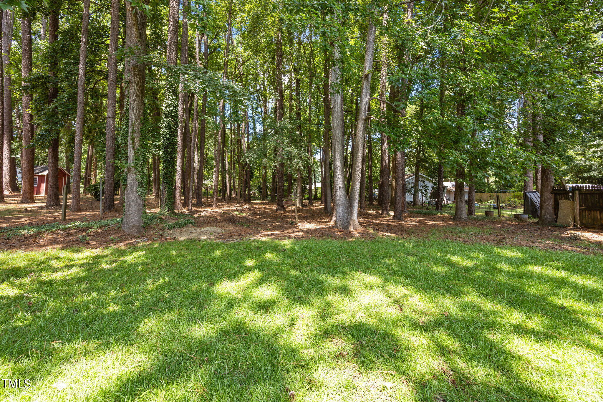 2809 Bardwell Road Raleigh, NC 27604 - Photo 18 of 19 a view of outdoor space with deck and tree