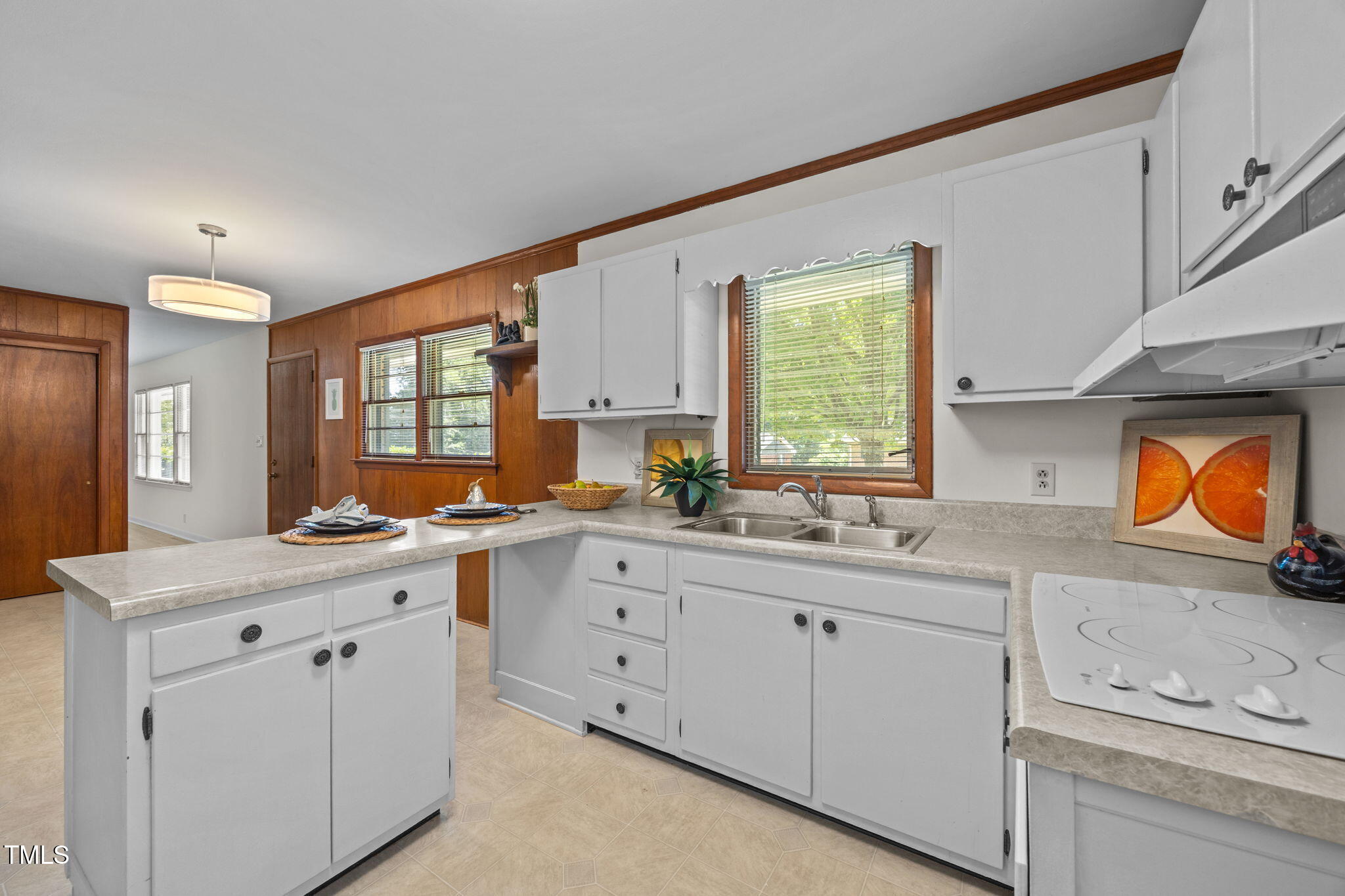 2809 Bardwell Road Raleigh, NC 27604 - Photo 8 of 19 a kitchen with sink stove and cabinets