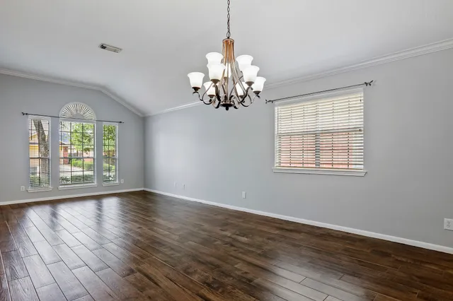 a view of a chandelier in a room