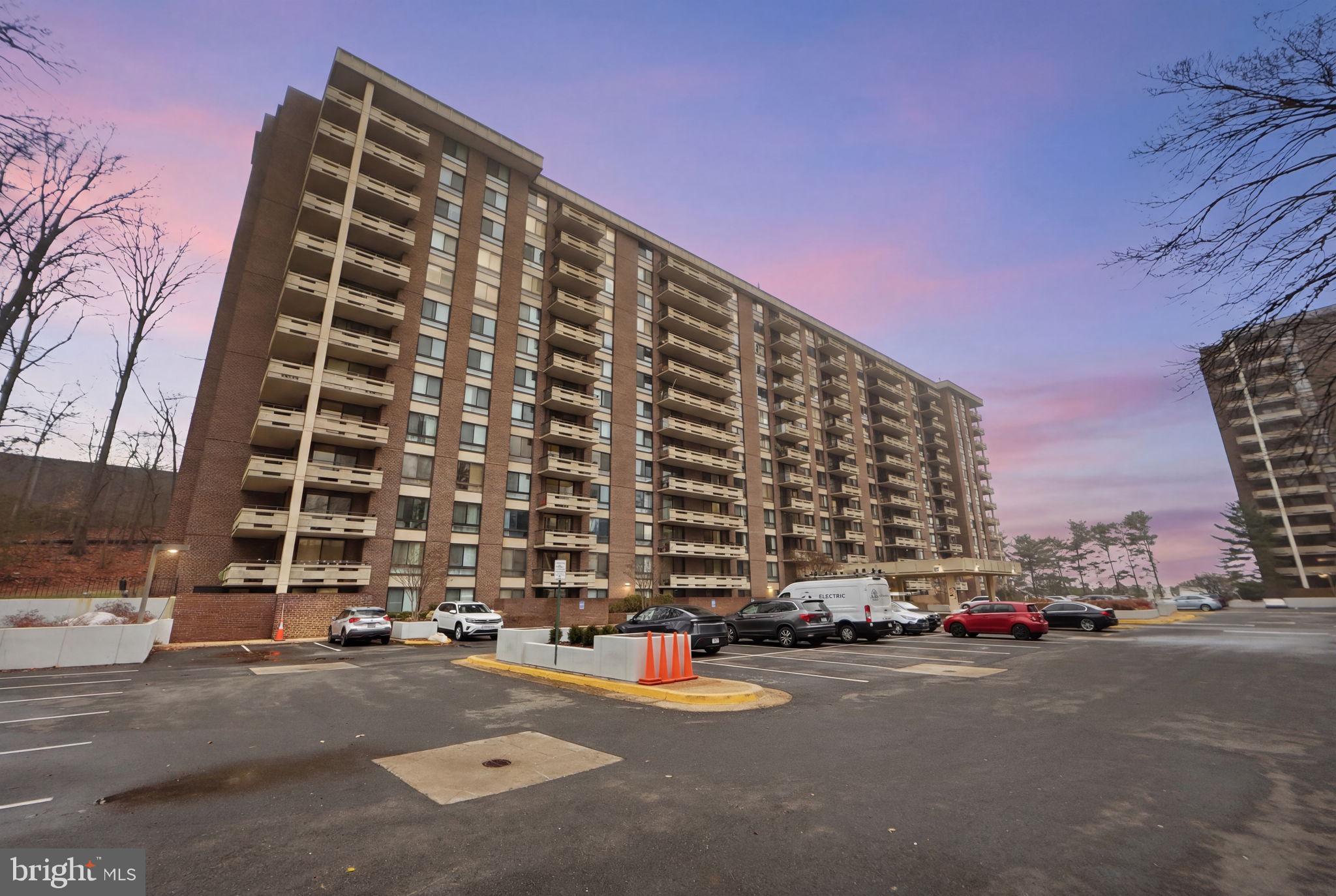 1808 Old Meadow Road, Unit 1201 McLean, VA 22102 - Photo 34 of 37 front view of a building with a street