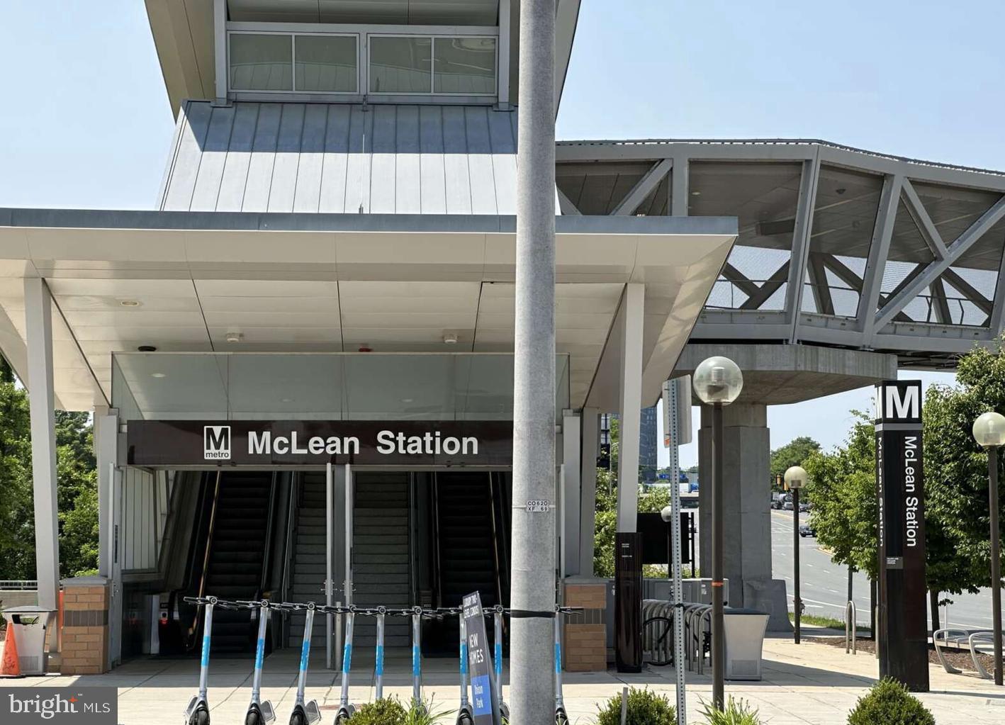 1808 Old Meadow Road, Unit 1201 McLean, VA 22102 - Photo 36 of 37 a front view of a building with glass windows and door