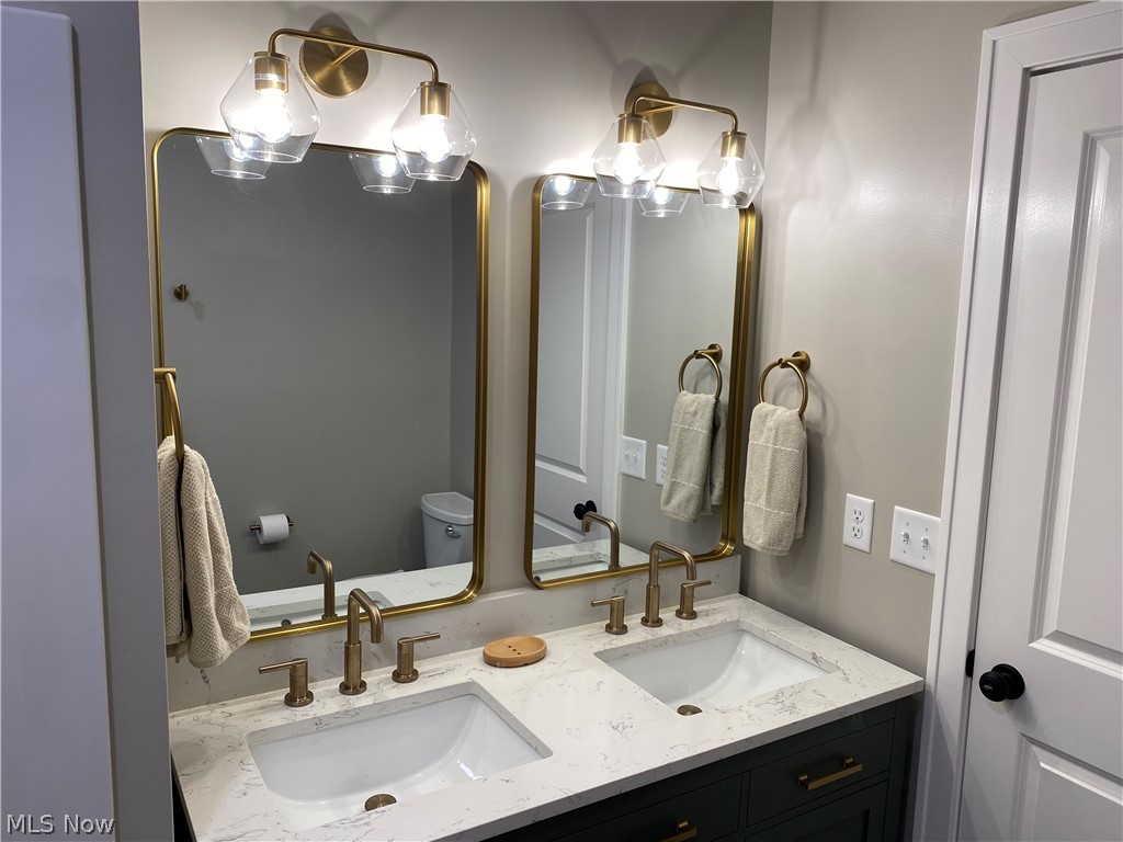 177 Paradise Road Painesville, OH 44077 - Photo 16 of 38 Fully updated main bathroom with double vanity and tub
