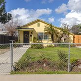 a view of a house with a big yard