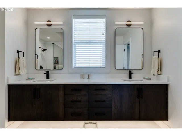 a bathroom with a sink and mirror