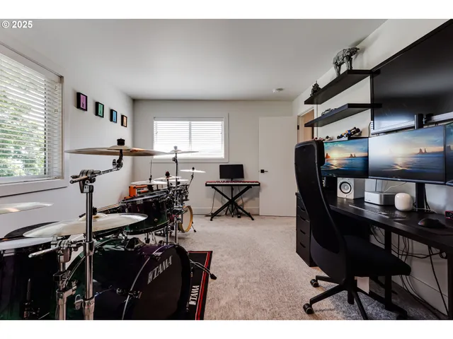 a view of a workspace and a window in a living room