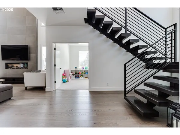 a view of livingroom with furniture and flat screen tv