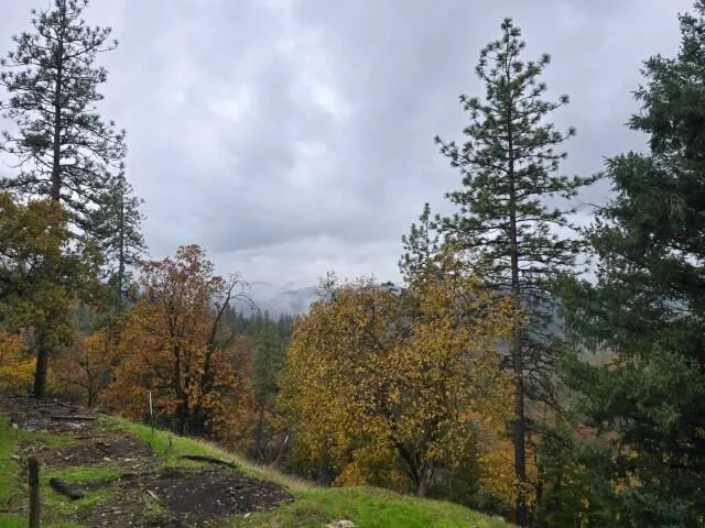 a bathroom with a sink toilet and a mirror