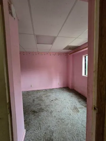 a view of a room with an empty space