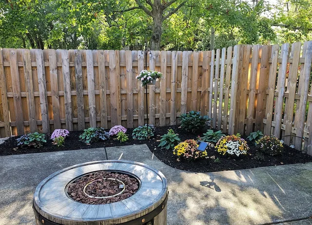 a view of a dinning table and some plants