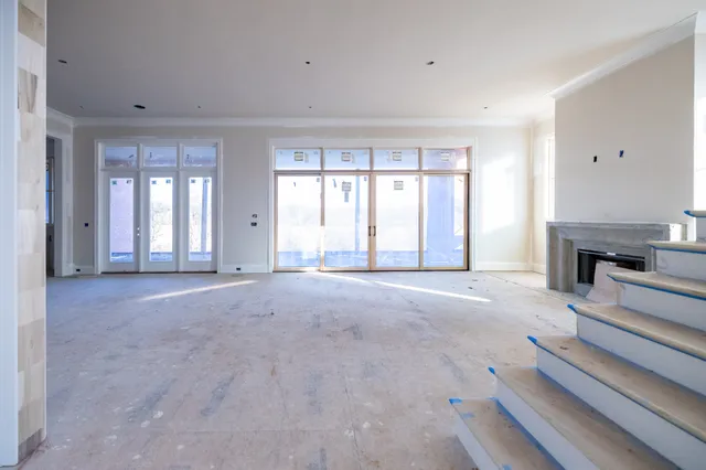 a view of an empty room with closet area