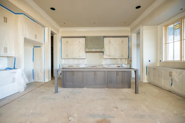 an empty room with closet area