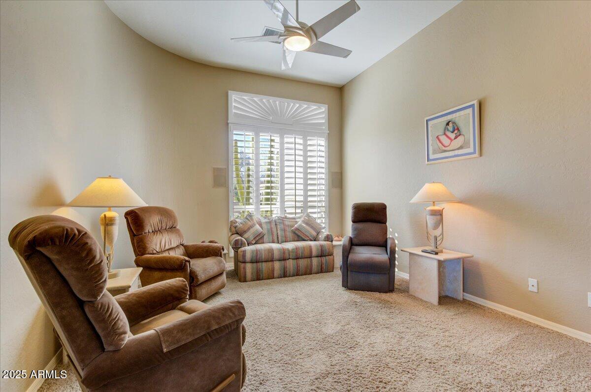 25633 North Abajo Drive Rio Verde, AZ 85263 - Photo 20 of 49 a living room with furniture and a flat screen tv