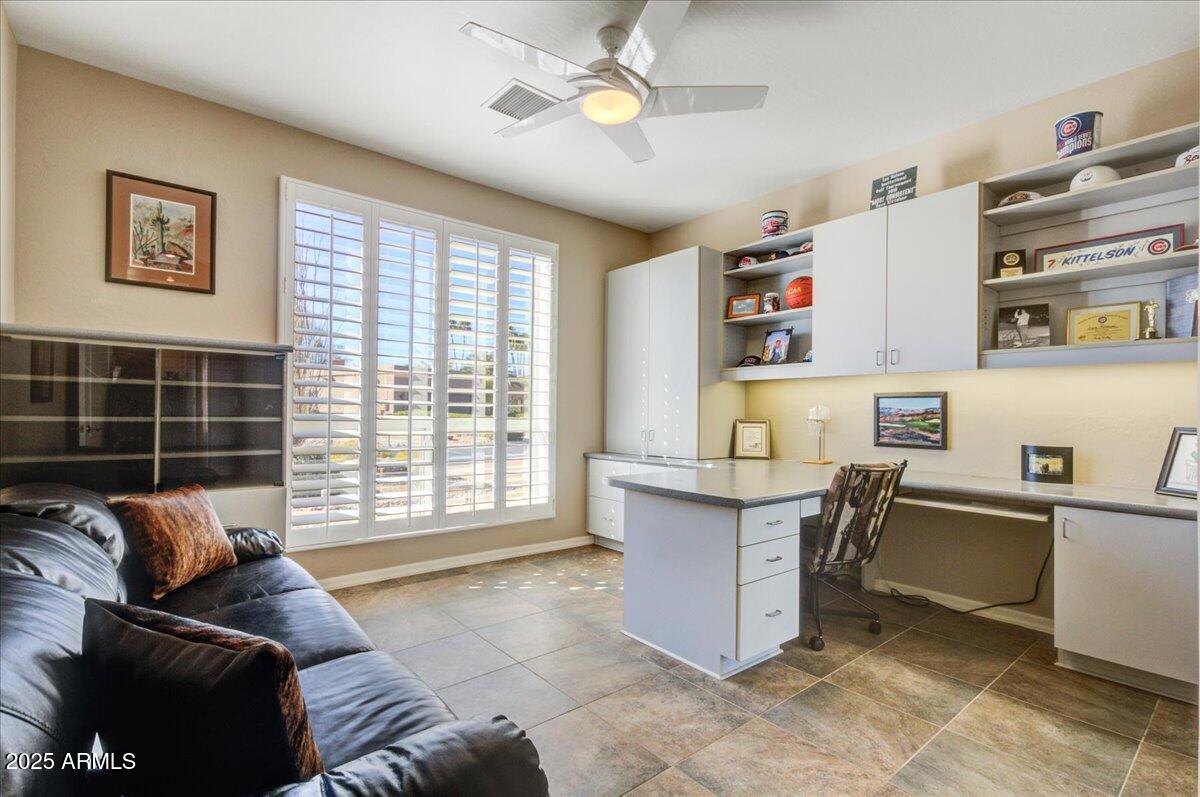 25633 North Abajo Drive Rio Verde, AZ 85263 - Photo 28 of 49 a living room with furniture and a window