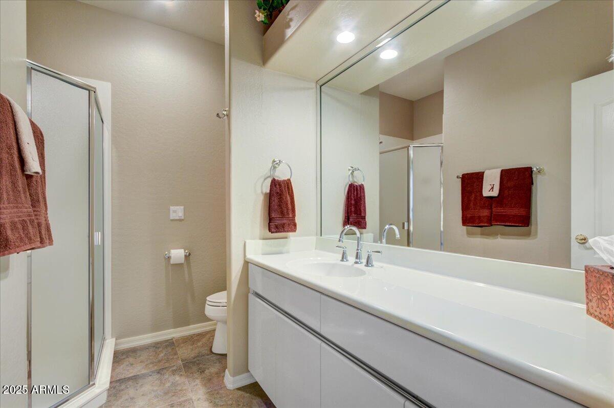 25633 North Abajo Drive Rio Verde, AZ 85263 - Photo 29 of 49 a bathroom with a sink and a mirror
