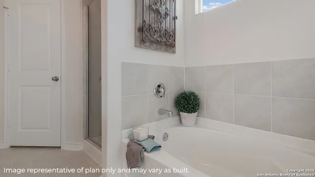 a bath tub sitting in a bathroom
