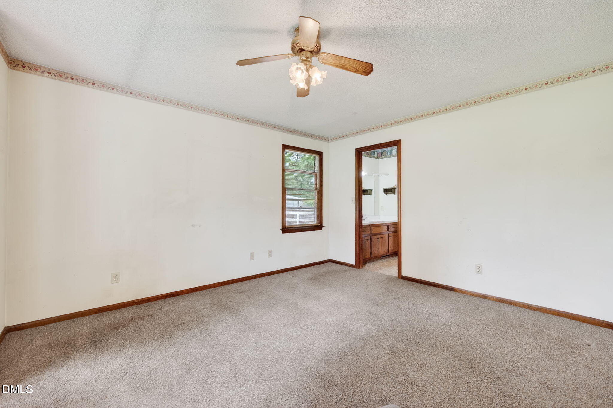350 Grantham School Road Goldsboro, NC 27530 - Photo 15 of 49 a view of an empty room with a window