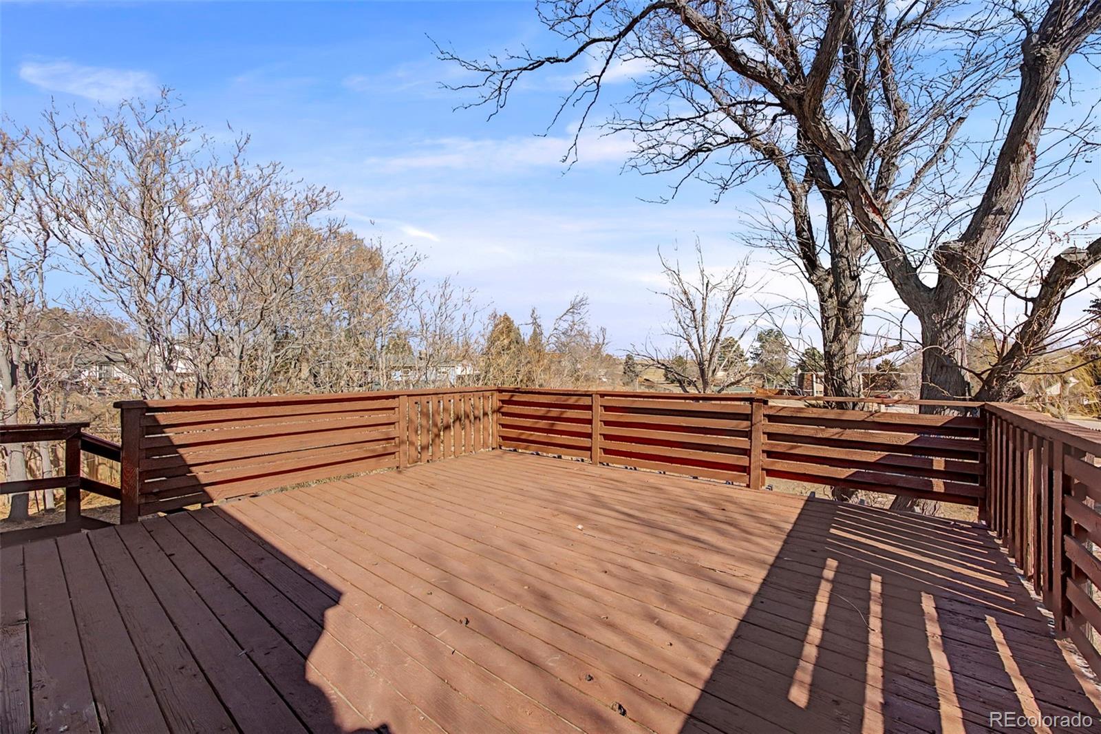 4394 South Van Gordon Way Morrison, CO 80465 - Photo 15 of 20 a view of street with wooden stairs and bench