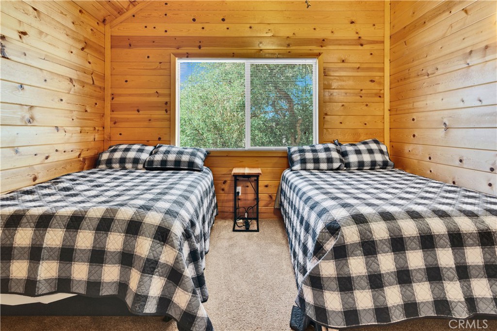 8040 Ready Road Bradley, CA 93426 - Photo 13 of 40 a bedroom with a bed and wooden floor