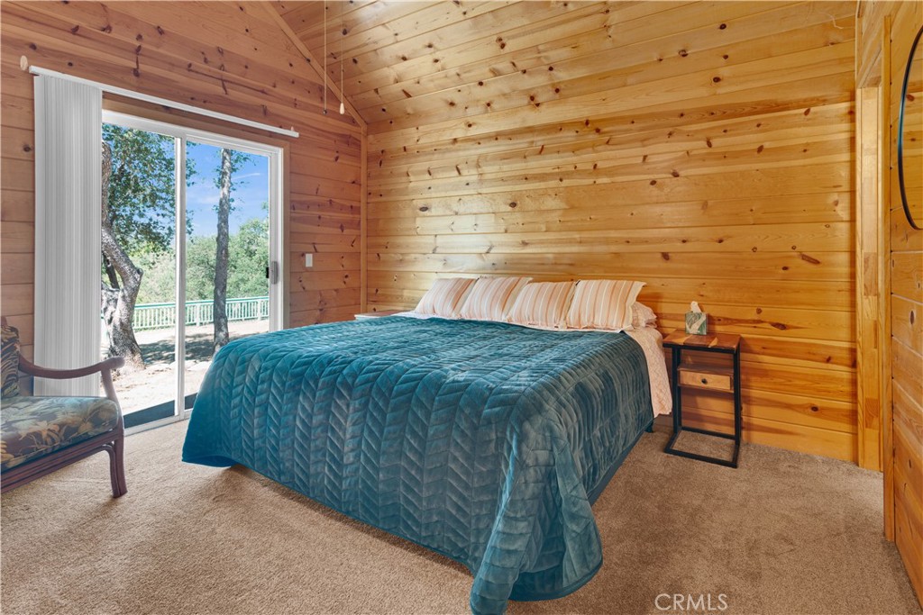 8040 Ready Road Bradley, CA 93426 - Photo 15 of 40 a bed sitting in a room next to a window