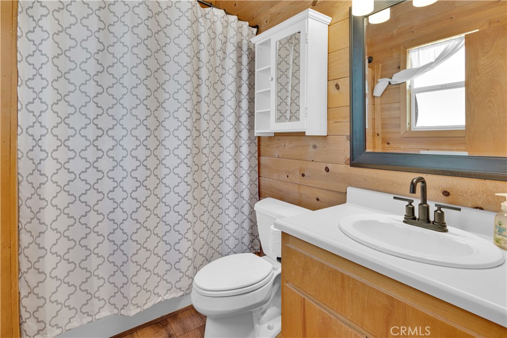 8040 Ready Road Bradley, CA 93426 - Photo 17 of 40 a bathroom with a sink and a toilet