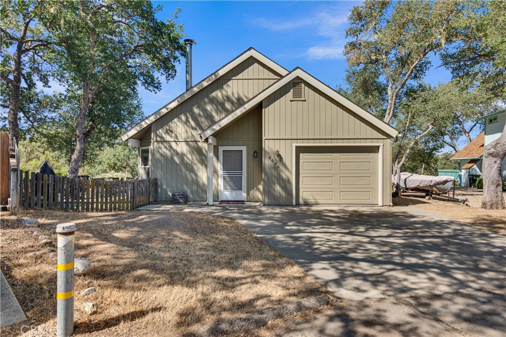 8040 Ready Road Bradley, CA 93426 - Photo 2 of 40 a view of a house with a yard and garage