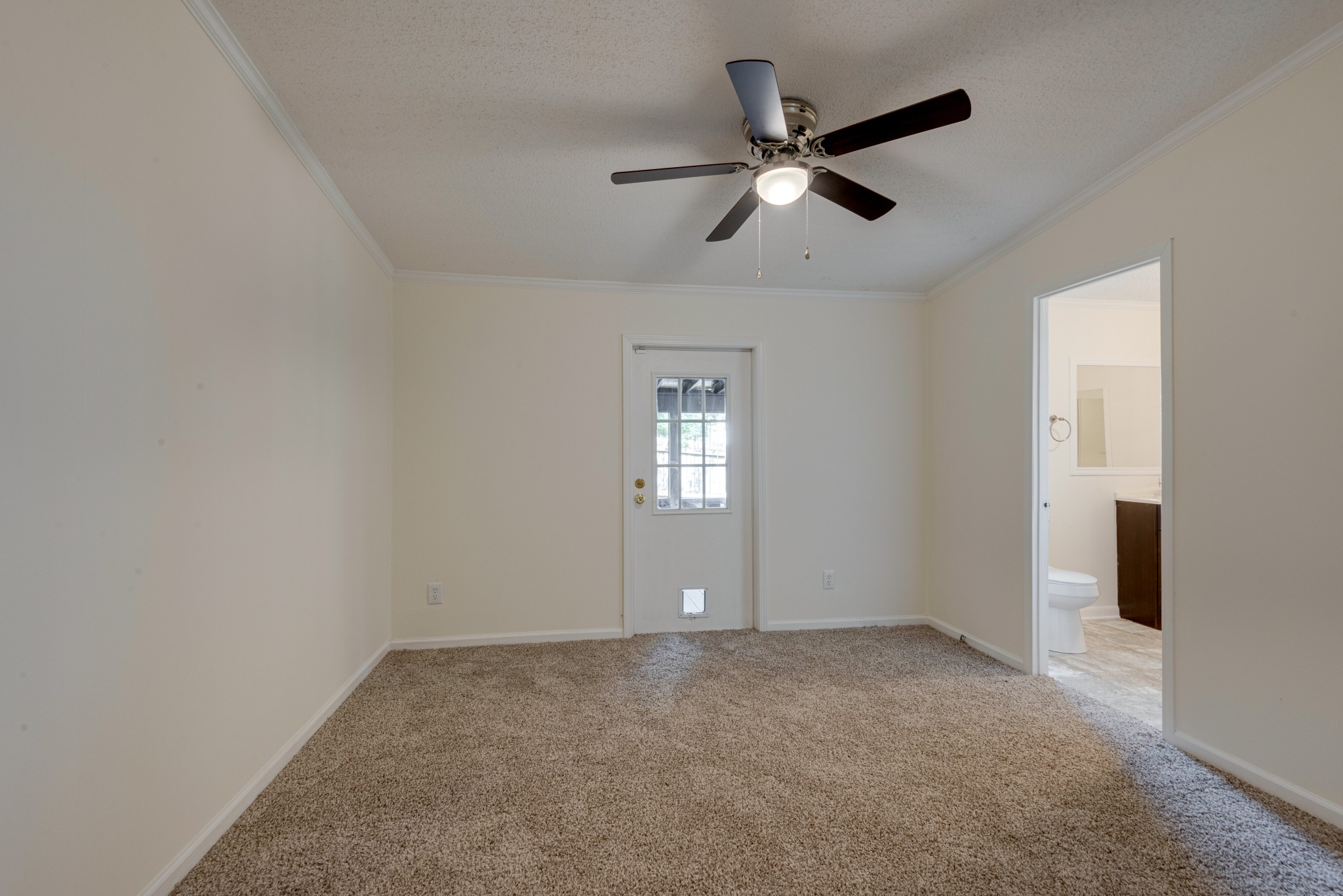 211 Hillcrest Road Kingston Springs, TN 37082 - Photo 12 of 28 a view of an empty room with a ceiling fan