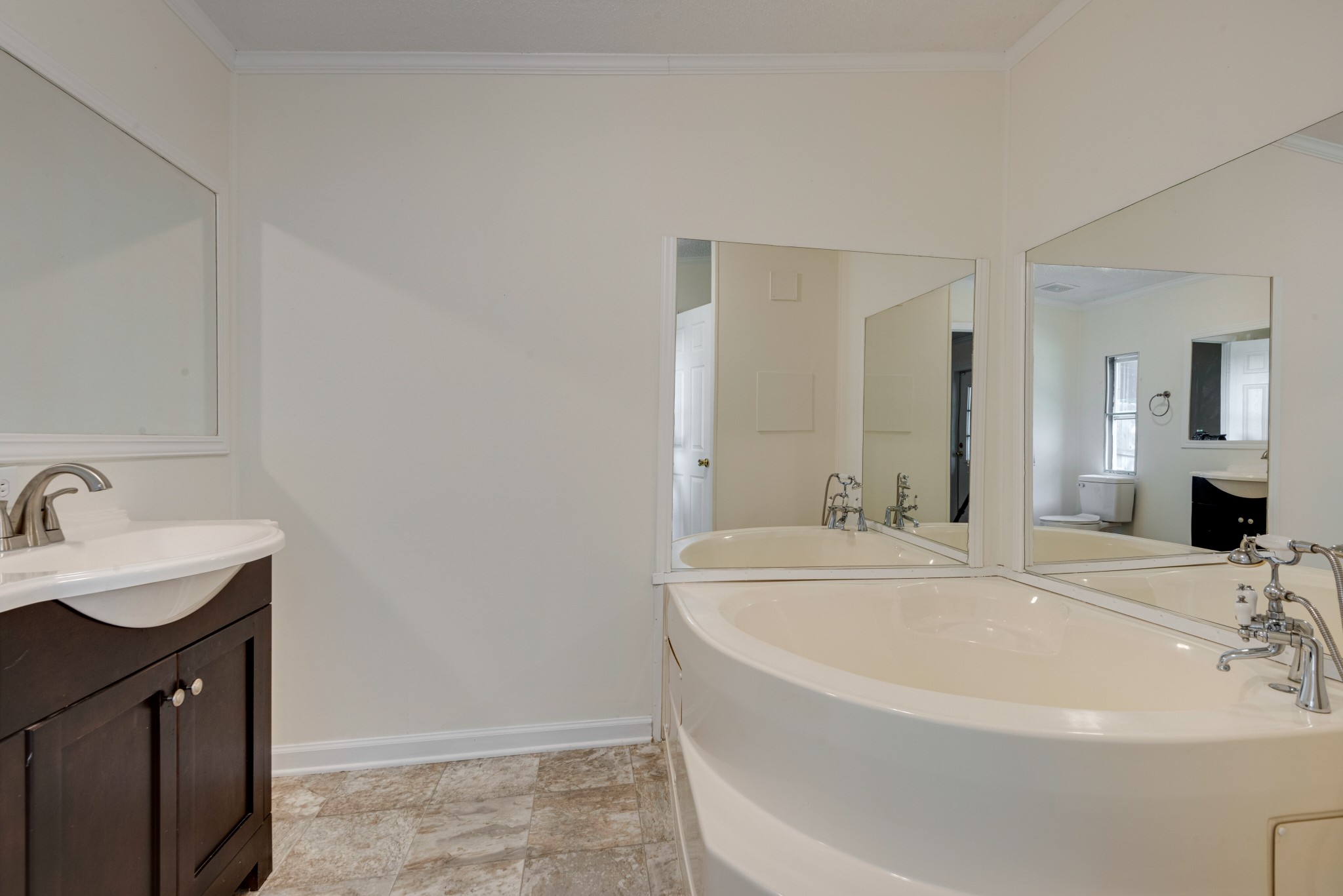 211 Hillcrest Road Kingston Springs, TN 37082 - Photo 15 of 28 a white bath tub sitting next to a bathroom sink