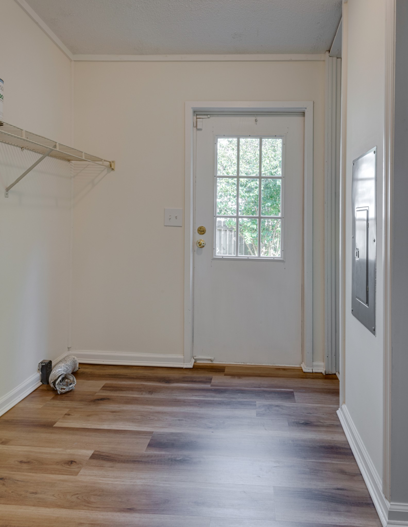 211 Hillcrest Road Kingston Springs, TN 37082 - Photo 23 of 28 a view of a room with wooden floor and fan