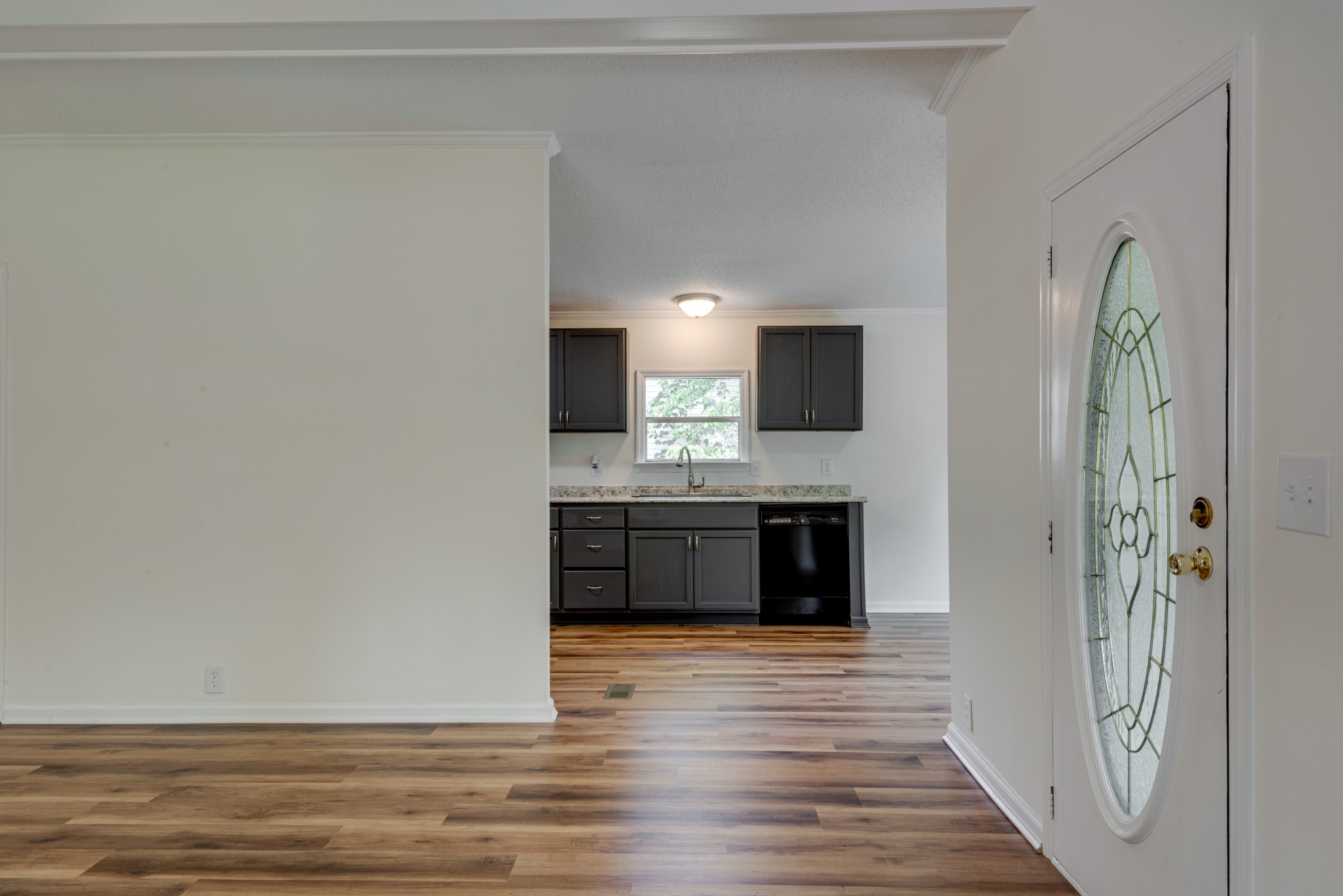 211 Hillcrest Road Kingston Springs, TN 37082 - Photo 7 of 28 a view of a kitchen cabinets and wooden floor