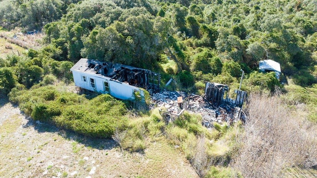 2277 Johnson Road Aransas Pass, TX 78336 - Photo 11 of 27 a garden view with sitting space