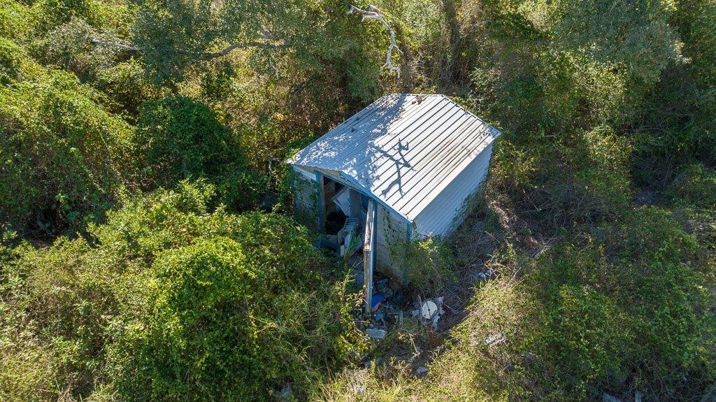 2277 Johnson Road Aransas Pass, TX 78336 - Photo 14 of 27 a view of a house with a tree