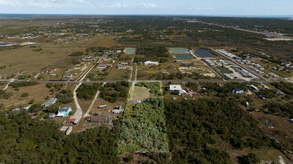 2277 Johnson Road Aransas Pass, TX 78336 - Photo 22 of 27 an aerial view of residential building and ocean
