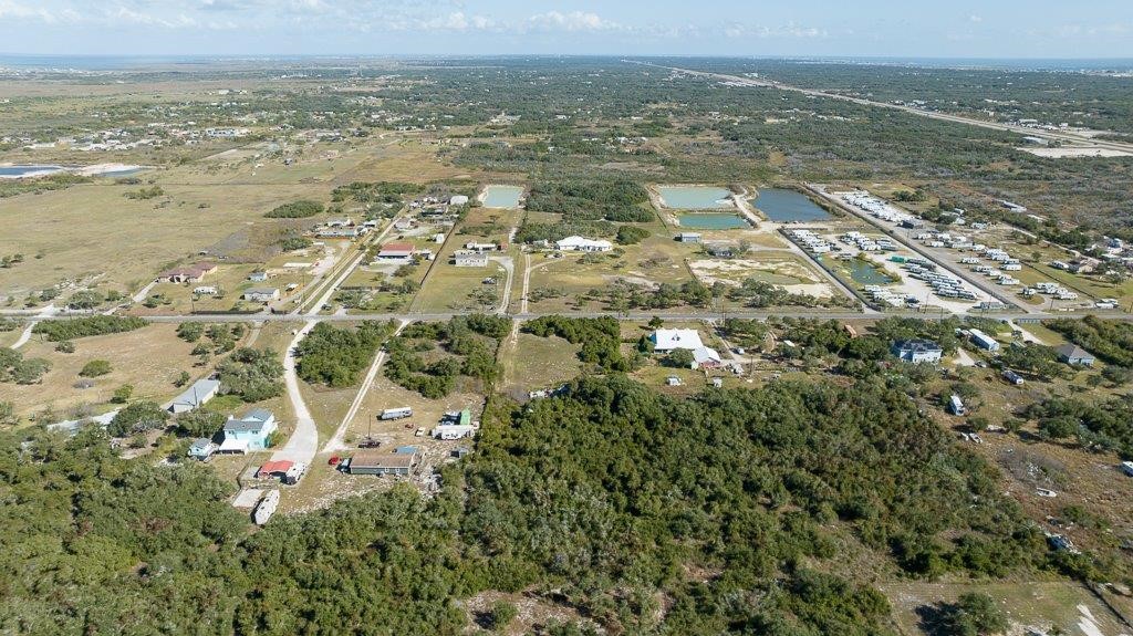 2277 Johnson Road Aransas Pass, TX 78336 - Photo 23 of 27 an aerial view of residential houses with outdoor space