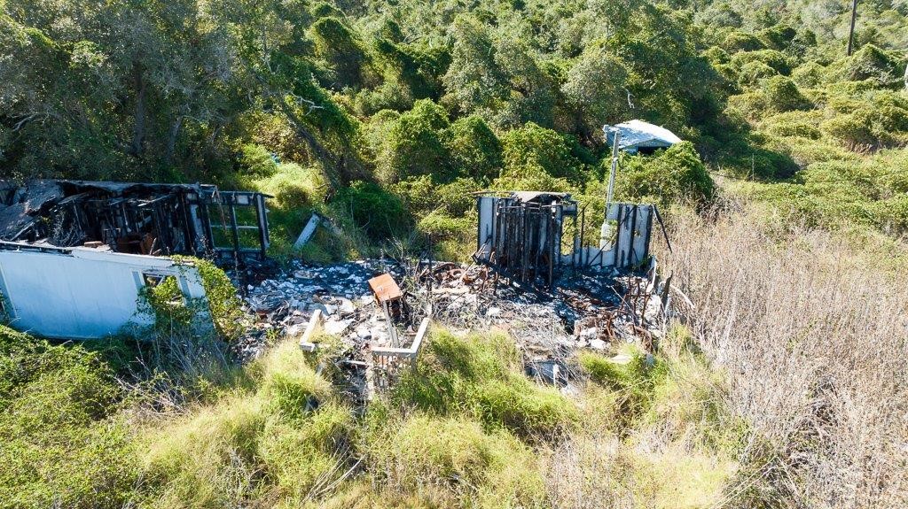 2277 Johnson Road Aransas Pass, TX 78336 - Photo 10 of 27 a view of a backyard with plants and large trees