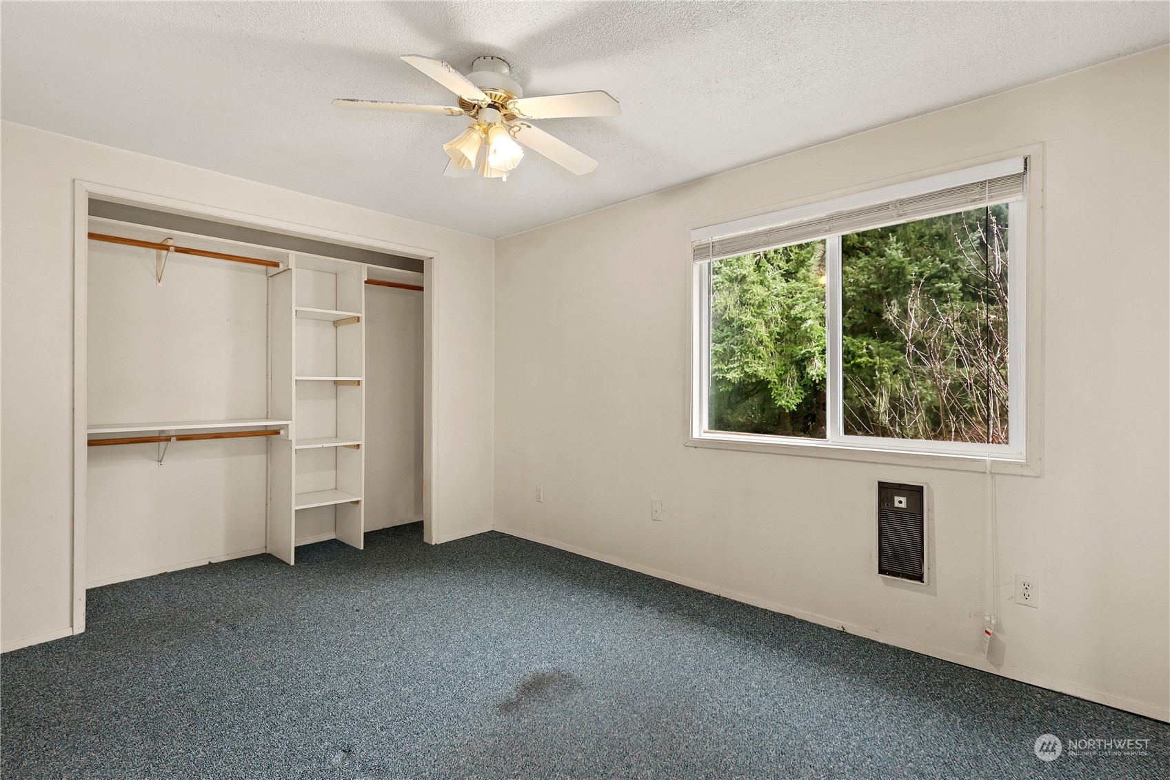 3640 Gull Harbor Road Northeast Olympia, WA 98506 - Photo 19 of 28 wooden floor in an empty room with a window