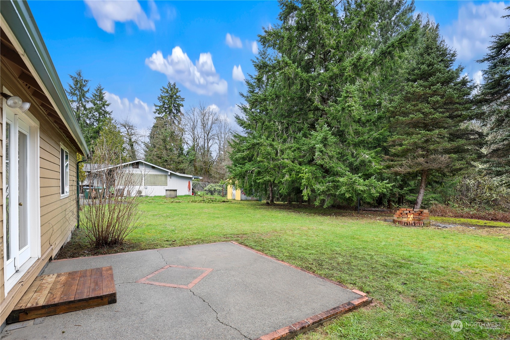 3640 Gull Harbor Road Northeast Olympia, WA 98506 - Photo 24 of 28 a view of a back yard of the house
