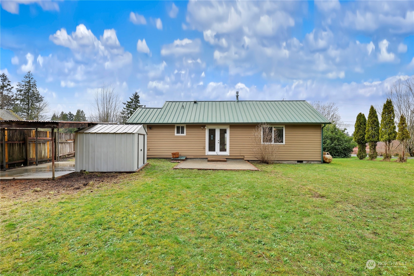 3640 Gull Harbor Road Northeast Olympia, WA 98506 - Photo 27 of 28 a view of a house with backyard and garden