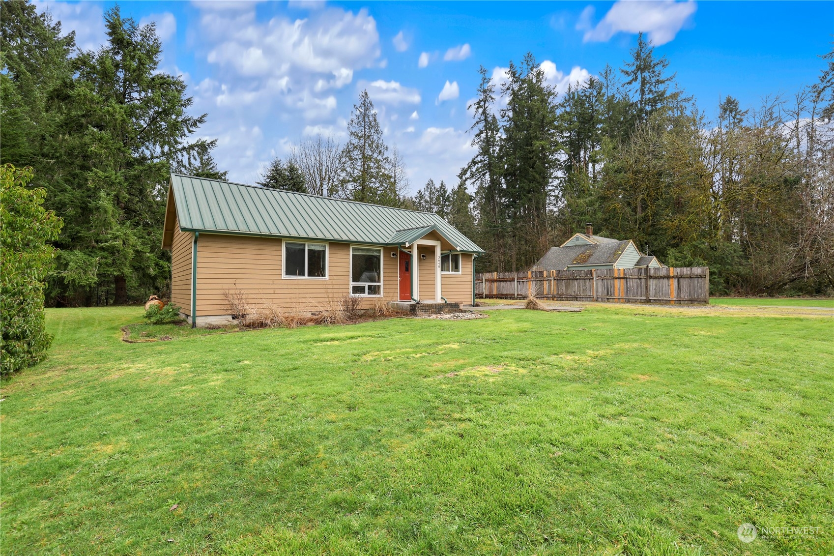 3640 Gull Harbor Road Northeast Olympia, WA 98506 - Photo 3 of 28 a view of a house with backyard and garden
