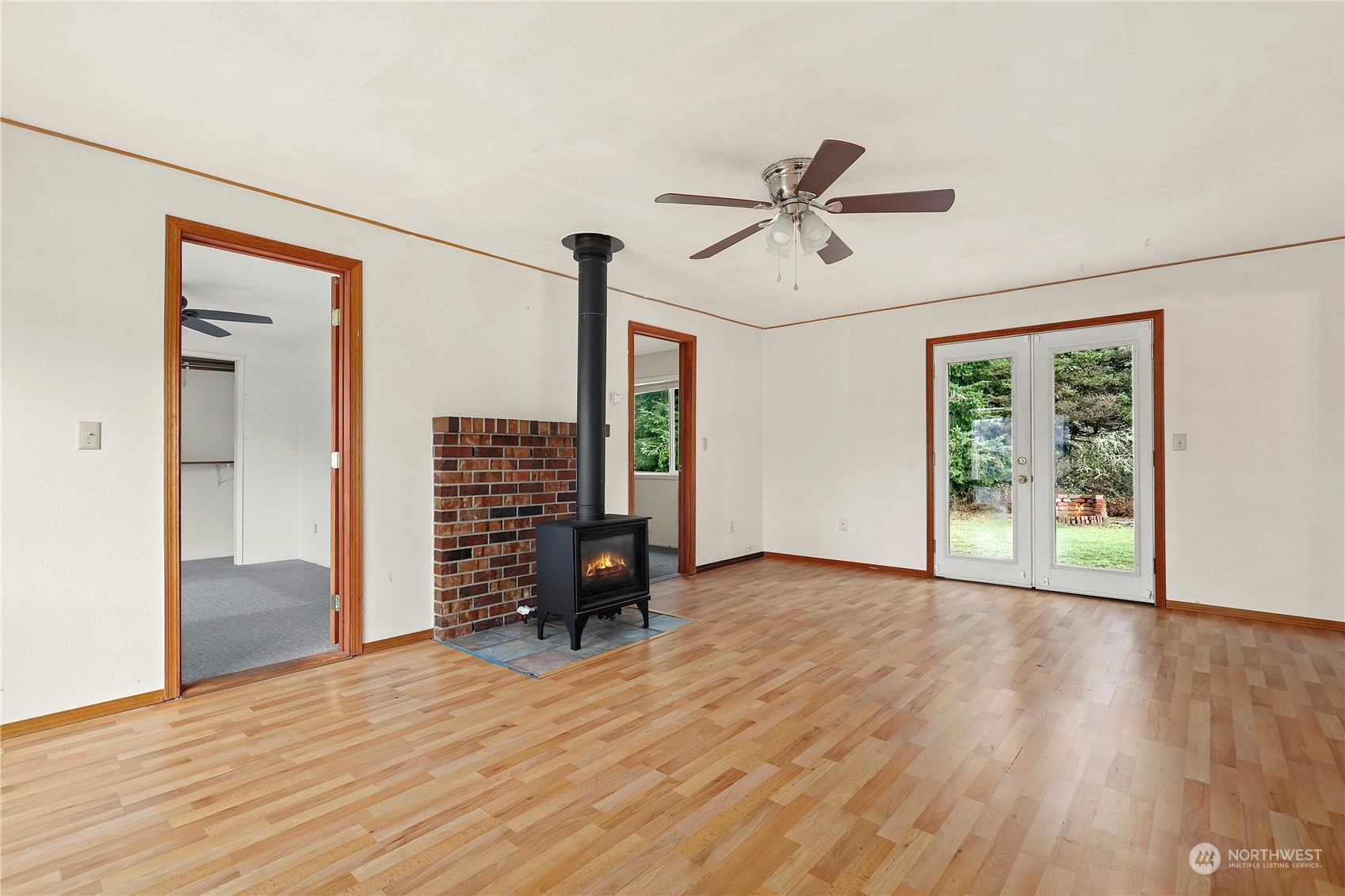 3640 Gull Harbor Road Northeast Olympia, WA 98506 - Photo 5 of 28 a view of empty room with wooden floor and fan