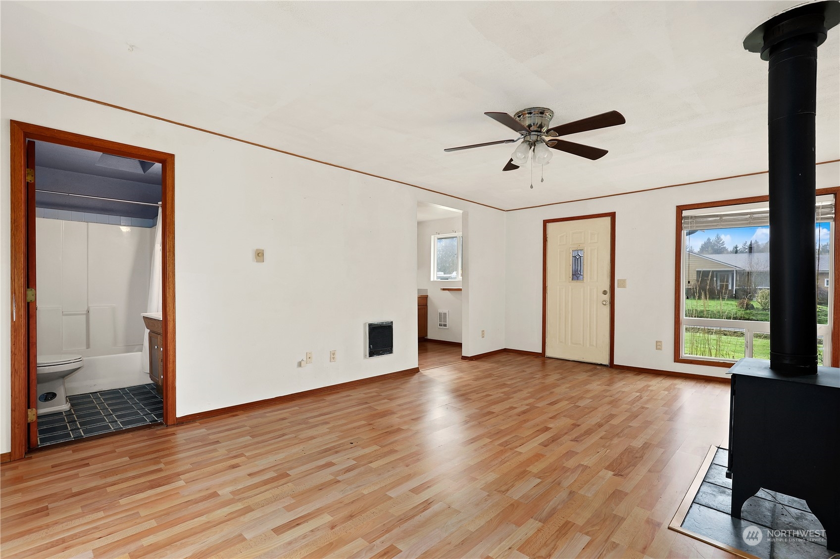 3640 Gull Harbor Road Northeast Olympia, WA 98506 - Photo 7 of 28 wooden floor in an empty room with a window
