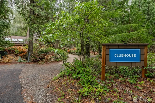 a sign that is on a brick wall