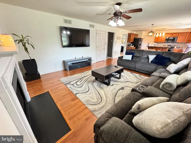 a living room with furniture and a couch