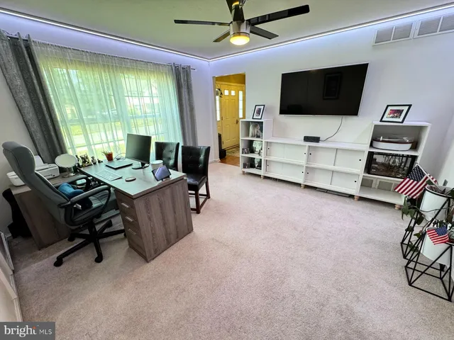 a view of a dining room with furniture