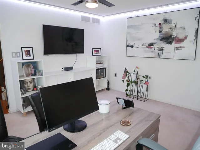 a view of kitchen island with furniture and wooden floor