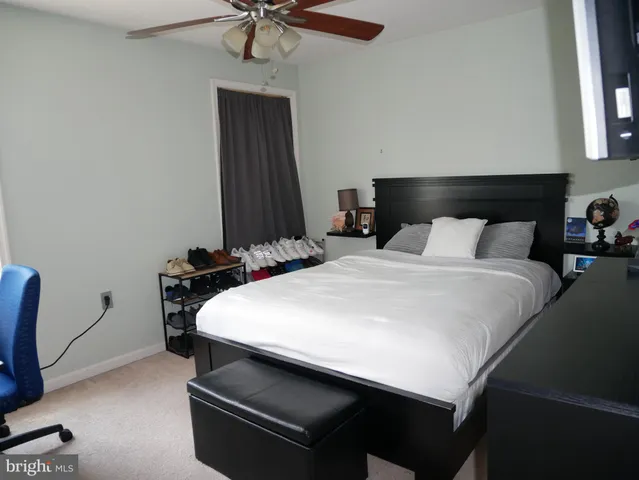 a view of a patio with couple of chairs