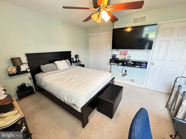 a view of backyard with a table and chairs