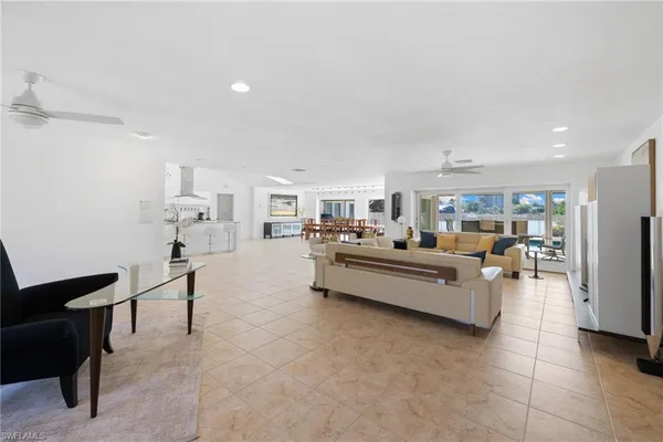 a living room with furniture and a table