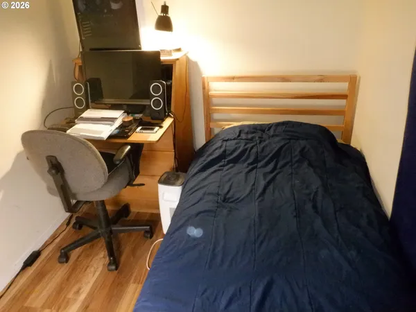 a view of workspace with wooden floor