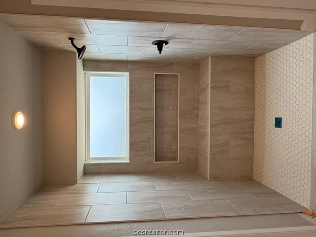 6428 Raleigh Loop College Station, TX 77845 - Photo 17 of 20 a view of walk in closet