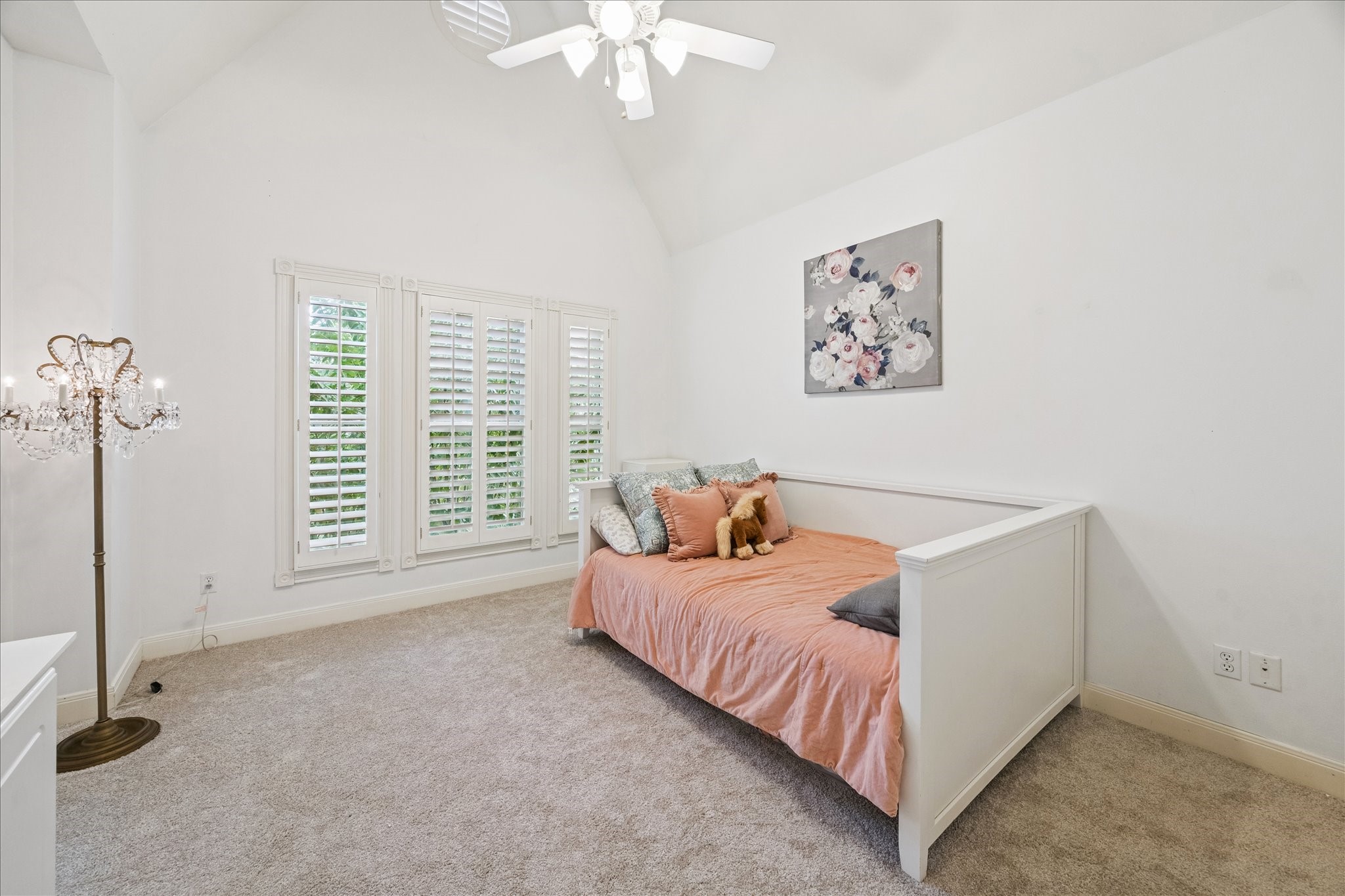 3818 Case Street West University Place, TX 77005 - Photo 20 of 29 a bed room with a bed and a chandelier